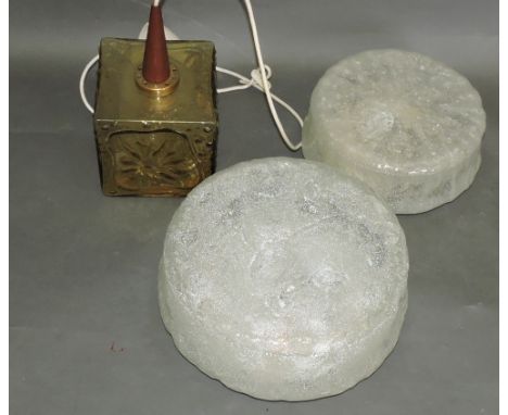 A square floral moulded amber glass pendant ceiling light, together with two circular frosted glass ceiling lamps. (3)