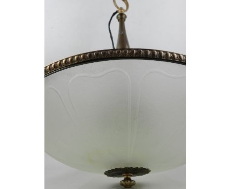 A circular metal ceiling light, having moulded glass shade. 