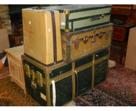 A collection of four various vintage travelling trunks, (4).