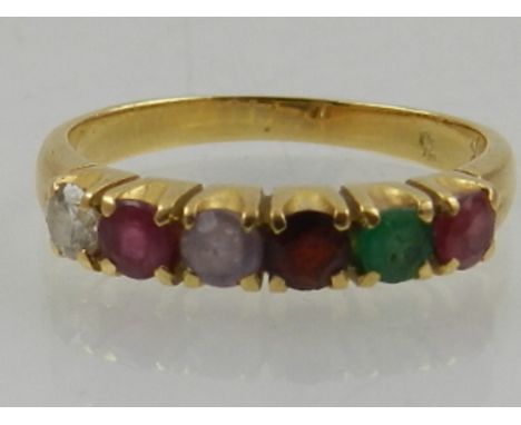 A yellow metal 'Regard' ring, set ruby, emerald, garnet, amethyst, ruby, and diamond, the shank stamped 18K.