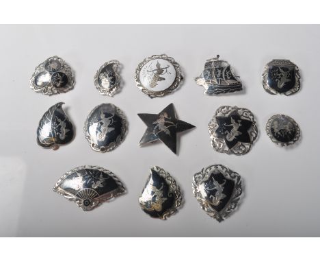 A collection of vintage stamped niello silver Siam brooches, all depicting Mekkalah, goddess of lightning in enamel. Marked s
