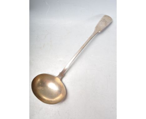 A&nbsp; antique Georgian hallmarked sterling silver spoon / ladle having a shaped handle with initials engraved to the top. B