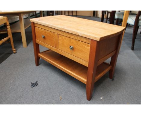 A light oak two drawer low table   CONDITION REPORT: 78cm wide by 42cm deep by 50cm high. 