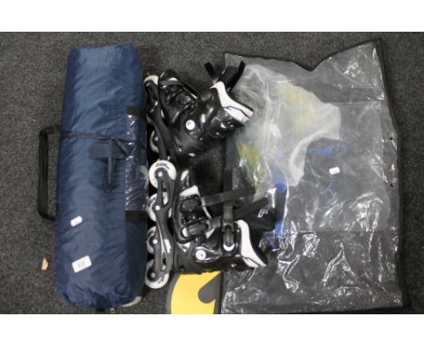 A tent together with a pair of roller blades 