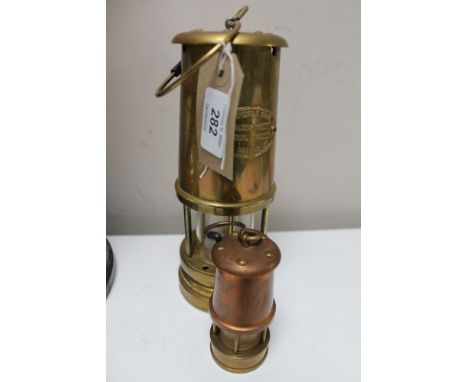 A Ferndale miner's lamp together with a miniature miner's lamp 