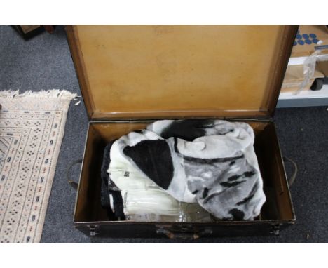 A trunk containing various pub glasses etc 