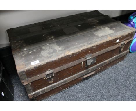 An antique cane bound trunk 