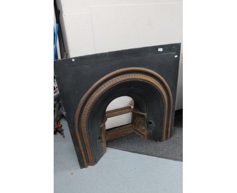 A Victorian style cast fire insert with fire grate