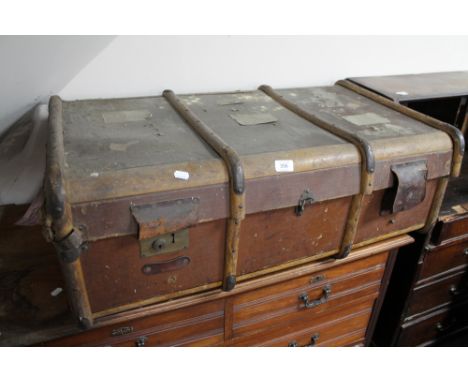 A cane bound vintage trunk 