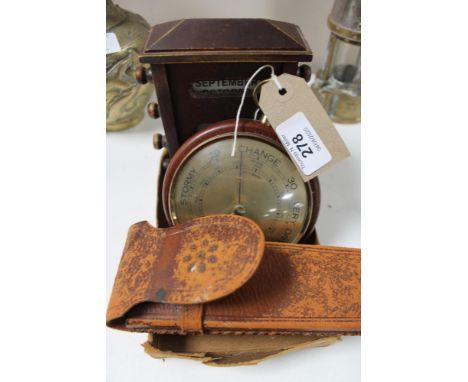 A calendar desk stand, barometer and compass, pen etc 