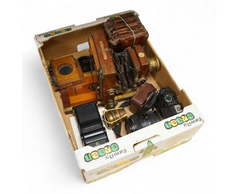 A Pentax P30 camera with Sunpak auto 2000DZ flash and instruction manual, together with an early 20th century mahogany cased 