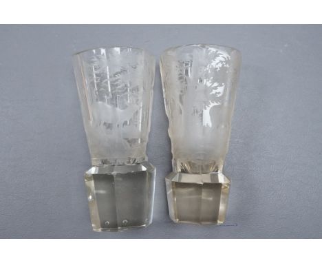 A pair of Bohemian intaglio engraved stag and doe beakers, late 19th century, height 15cm