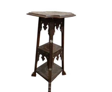 A Damascan mother of pearl inlaid carved hardwood three tier plant stand, width 48cm, height 102cm