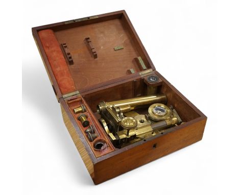 A mahogany cased 19th century brass field microscope, the body separates into sections, in a fitted case together with a sele