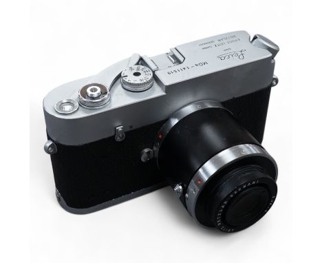 A Leica M Series MDa camera, with a Leitz 0.32:1 lens, the body stamped ‘1411519’