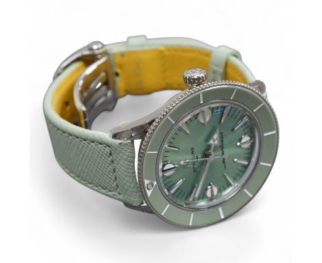 A lady's recent stainless steel Breitling SuperOcean Heritage Automatic cal. 38 57 chronometer wrist watch, with light green 