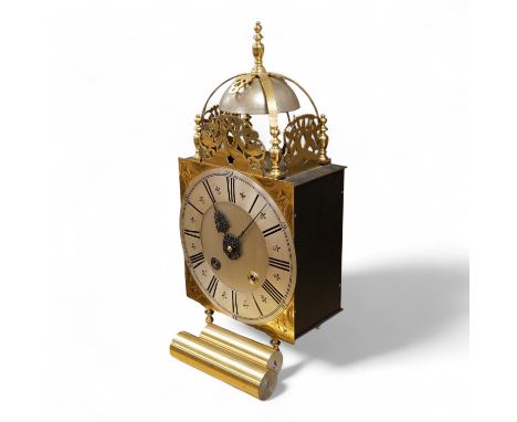 A large lantern style wall clock, 60cm high