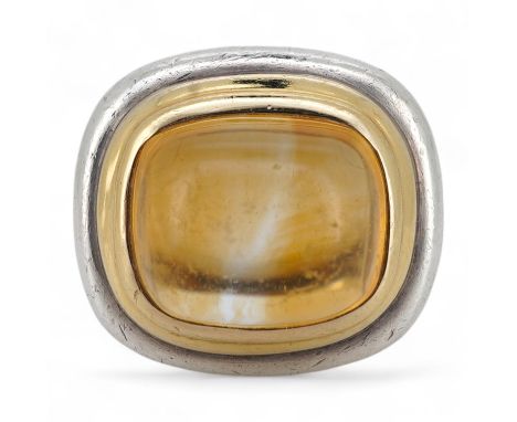 Paloma Picasso for Tiffany &amp; Co., a citrine ring, set with a sugarloaf cabochon citrine, collet-set in bicoloured silver,