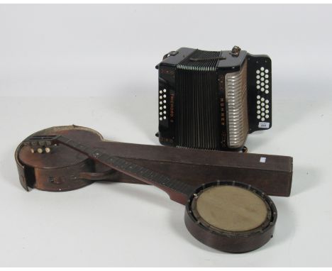 A cased Banjo (damaged); together with an Accordion. (2) 