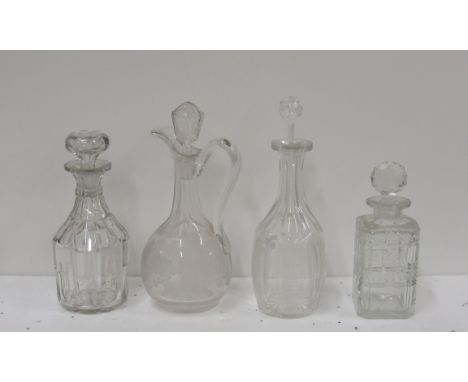 A heavy Victorian cutglass and engraved Claret Jug and stopper, decorated with vines and leaves; a similar Decanter and stopp