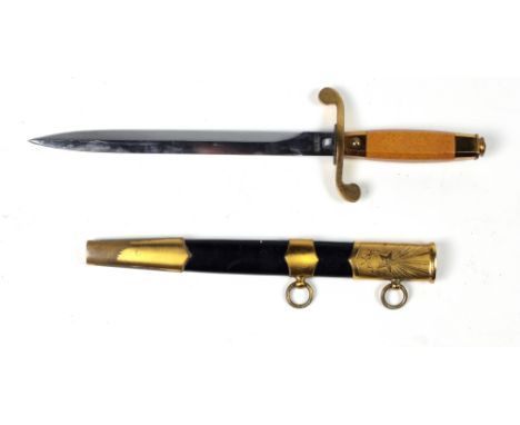 A good quality Russian Dagger, with decorated brass and leather scabbard, 21cms (8 1/4") blade. (1)