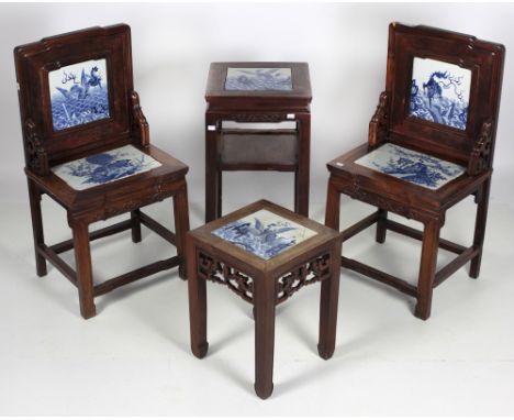 A pair of early 19th Century Chinese hardwood and lacquered Side Chairs, the shaped backs over large Xanghi period blue and w