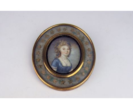 Early 19th Century Continental SchoolMiniature: Fine oval portrait of a French Lady with low cut blue dress, in attractive or
