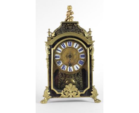 A 19th Century French Boulle Mantle Clock, by Jean Godde, Paris, with cherub capital, profusely decorated with brass inlay an