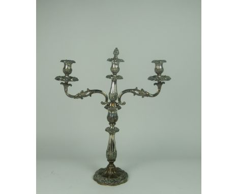 A heavy 19th Century three light two branch Candelabra, silver plated on copper, 55cms (21 1/2") high. (1)