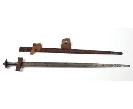 A good early 19th Century Middle Eastern Long Sword, with 81cms (31 1/4") reeded steel blade, in original decorated hand tool