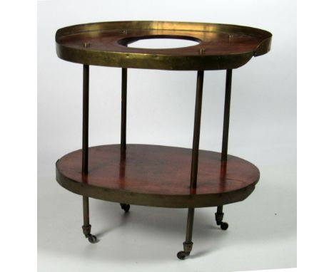 A Victorian Campaign/Military mahogany and brass Washstand, the two tiered structure with opening in upper shelf and brass mo