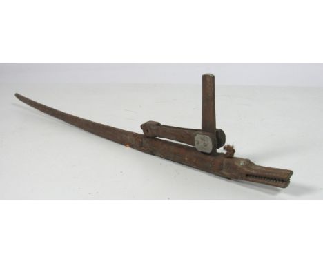 A rare and unusual carved "Opium" Weighing Scales, with lever balance, modelled as a crocodile, approx. 96cms (38") long. (1)