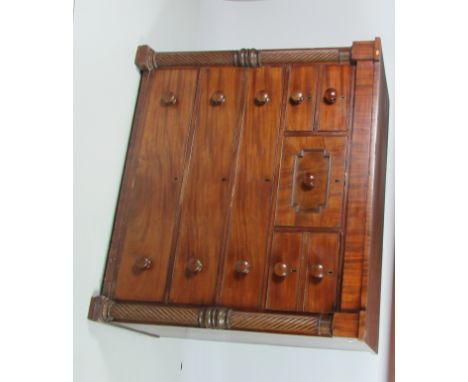 A 19th Century Nelson type mahogany Scotch Dresser, with four short and three long drawers flanked by rope type pillars. (1)