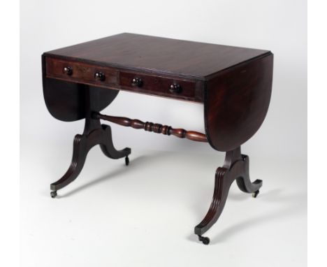 A 19th Century Irish (possibly Cork) mahogany Sofa Table, the plain top over frieze drawers on four reeded outsplayed legs, u