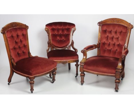 Three similar Victorian walnut Occasional Chairs, each with a button back, sprung seat, raised on turned tapering fluted legs