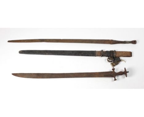 An antique Indian Tulwar Sword, 87cms (34 1/4") long; and a large antique Eastern straight Sword, the handle damaged, the 81c