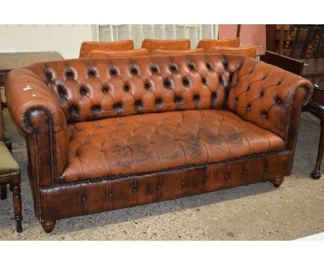 Brown leather Chesterfield sofa