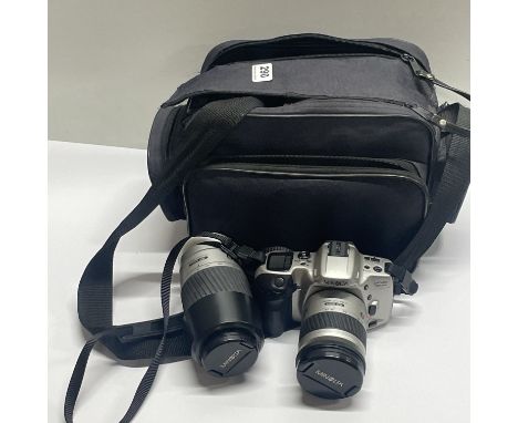 A Minolta single lense reflex camera with two lenses.