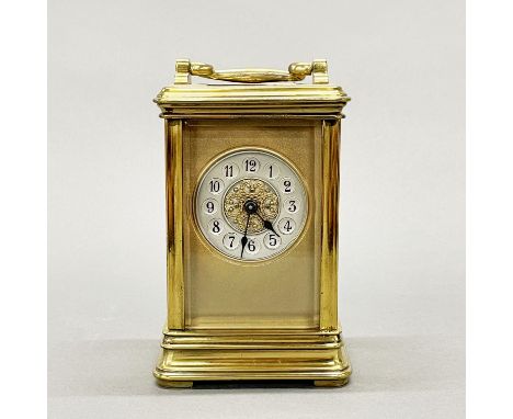 A brass carriage clock, H. 13cm.