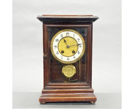 A 19thC striking mantel clock, H. 30cm.