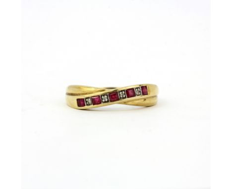 A 9ct yellow gold ruby and diamond set ring, (S), gross weight approx. 2.4gr.&nbsp;