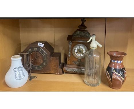 An Art Deco mantle clock together with a further mantle clock and four other items.