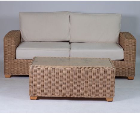 A MODERN RATTAN CONSERVATORY SUITE (4)Comprising a two seater sofa 195cm wide; 85cm high, two matching armchairs 95cm wide; 8