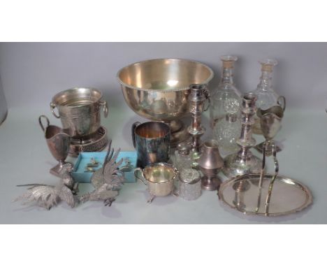 A QUANTITY OF SILVER PLATED ITEMS TO INCLUDE A PAIR OF LATE VICTORIAN CANDLESTICKS (QTY)A large twin handled centre bowl, a p