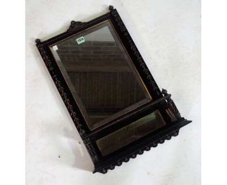 AN AESTHETIC MOVEMENT OVERMANTEL WALL MIRRORWith bevelled glass, 41cm wide; 64cm high