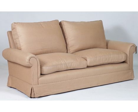 A MODERN HARDWOOD FRAMED TWO SEATER SOFAWith beige upholstery 190cm wide; 80cm high