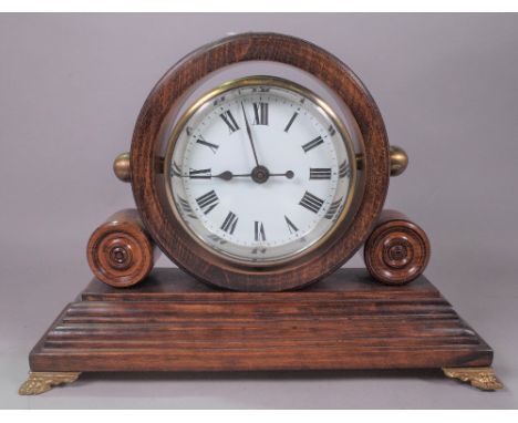 A 20TH CENTURY ARCHED OAK MANTLE CLOCKWith sweeping centre seconds