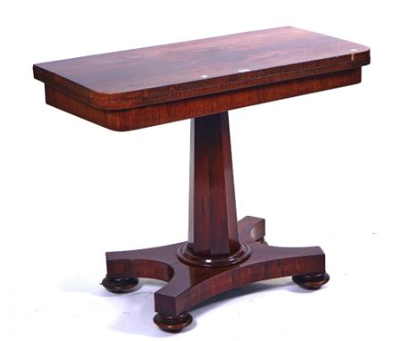 A WILLIAM IV ROSEWOOD D-SHAPED CARD TABLEOn octagonal column, 91cm wide; 75cm high