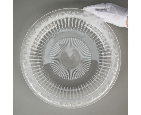 Lalique, France. Glass "Marguerites" centerpiece bowl with a ribbed bowl and a frosted rim with molded daisies. Etched maker 