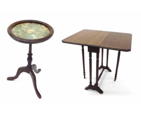 Edwardian mahogany Sutherland table, 24" wide; together with a circular occasional tripod table with a glass inset embroidere